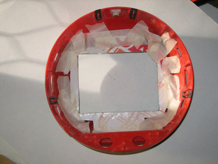 Cardboard template secured with tape