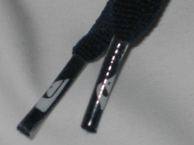 Genuine shorts fetures logo printed on aglets.