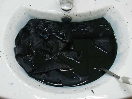 Add the fabrics to the dye bath